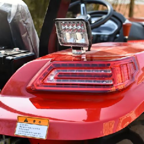 The red 100 hp agricultural tractor The red 100 hp agricultural tractor